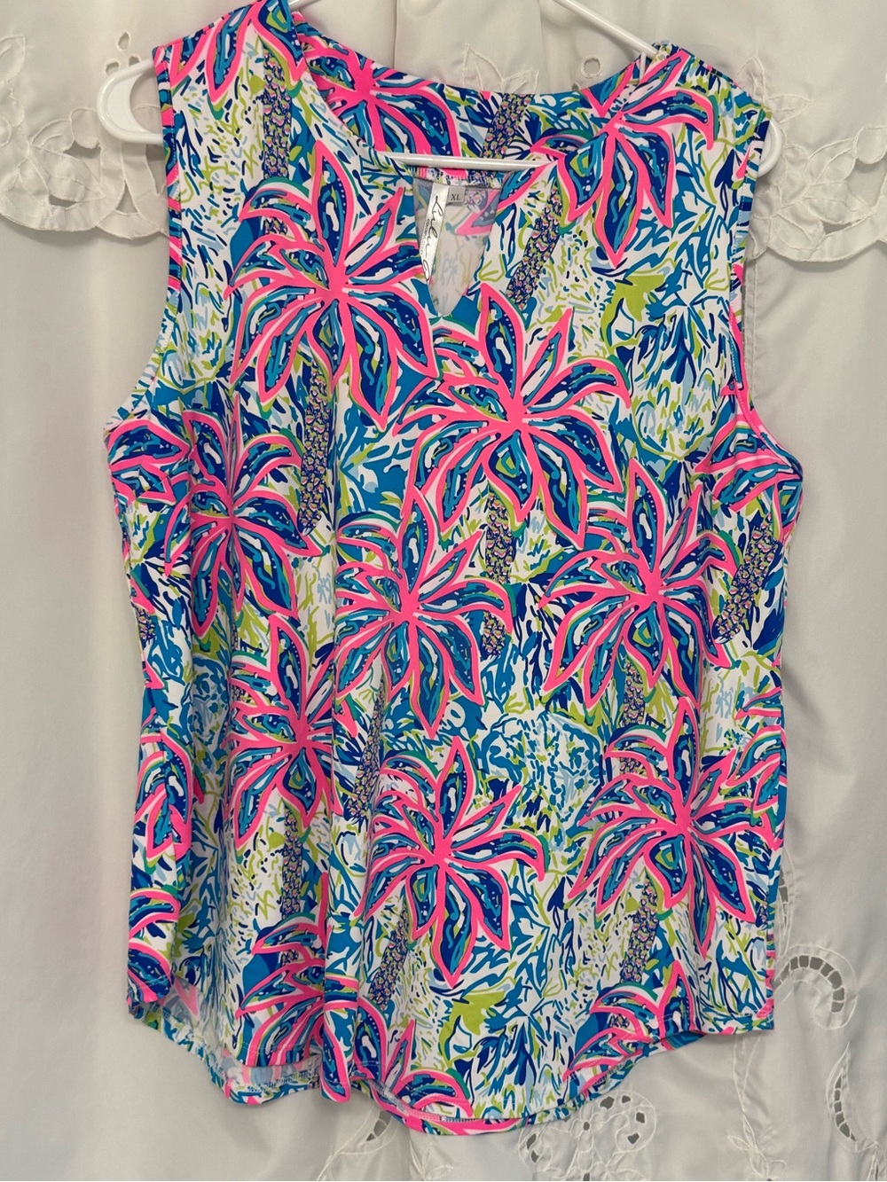 Lulu B  Sleeveless split neck top in tropical print